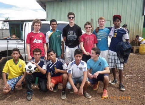 Zack Walsh (back row, far left)  posing with participants following his soccer clinics in Tipitapa, Nicaragua.