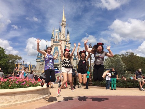 Wang and her friends jump for joy on their senior trip, Grad Bash.