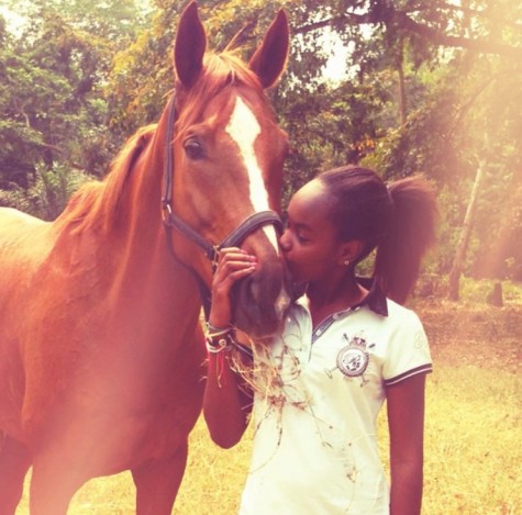 Masungu hanging out with her horse back in Africa