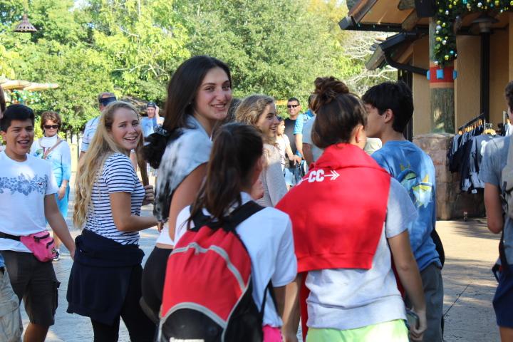 Juniors, on the junior class trip excitedly venture through Busch Gardens in their pack of friends.