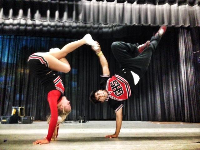 Junior Mathew Forrero showing off his moves with squad member Marissa Wiliford.