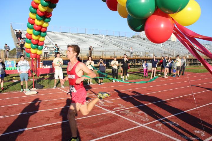 Junior Alexander Elortegui is the first runner to complete the Stride for Senegal 5K.