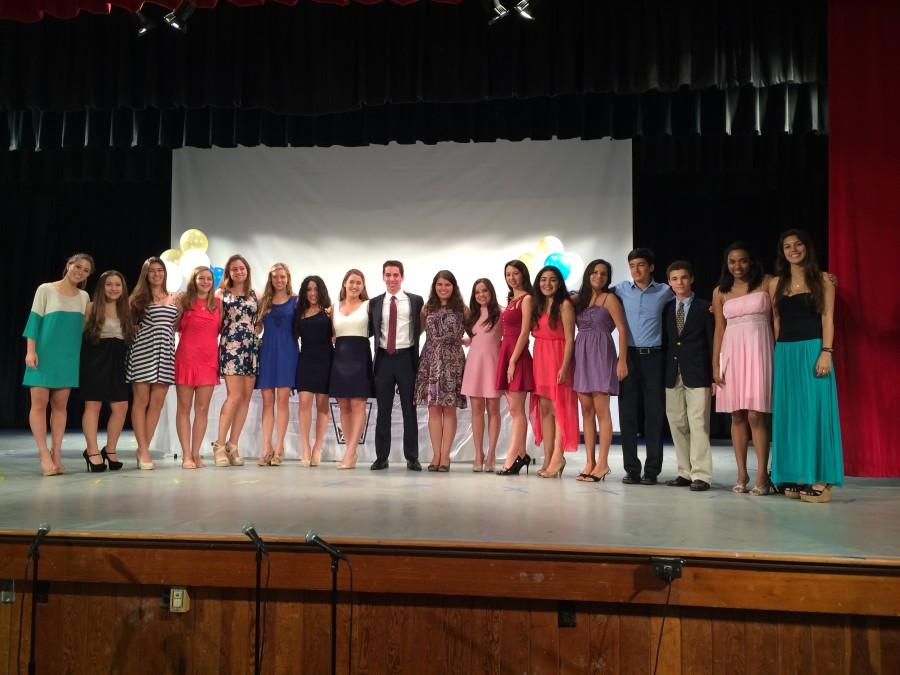 Current and incoming NHS officers stand together as the Induction Ceremony comes to a close.