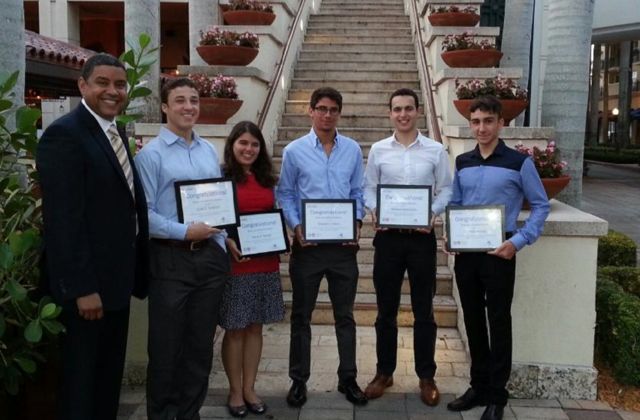 Seniors Cristian Alonso, Edward Fallon, Michael Hammond, Cole Scanlon and Derya Tansel are all awarded a $1,000 scholarship to pursue a degree in engineering. 