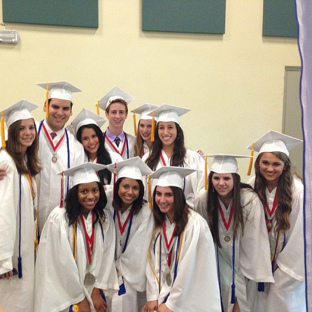 Members of the Class of 2013, including Carson Morris, Gabriella Gonzalez, and Jake Mekin, smile on the day of their graduation.