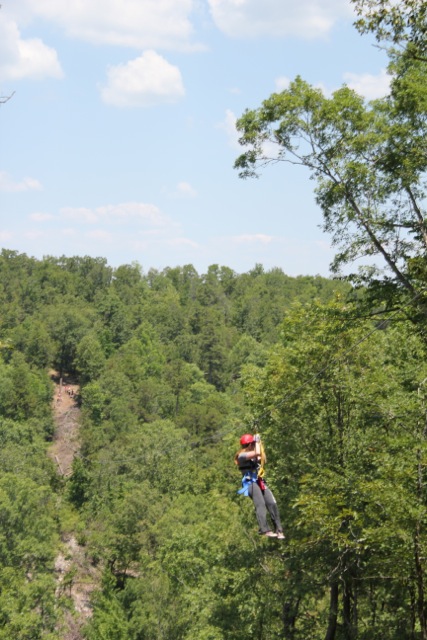 Claire zip lining in Arkansas near Hot Springs in the Ozark Mountains. 