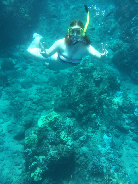 Claire snorkeling at Anini Beach in Kauai, Hawaii.