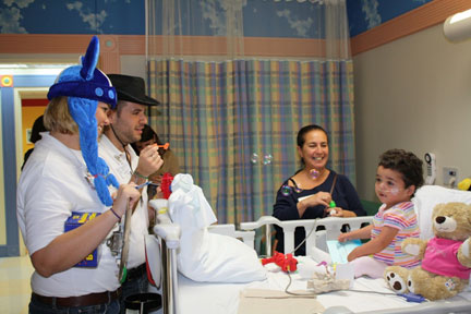 Volunteers entertaining the patient.