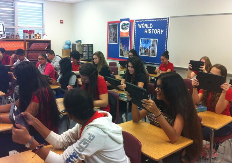 Ms. Cosgrove's World History class gets used to the new tablets.