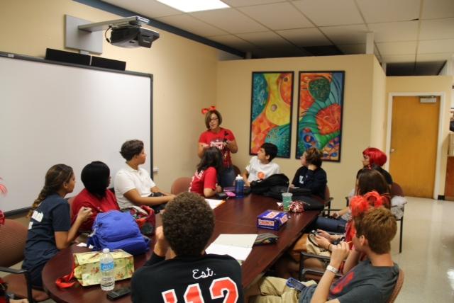 Activities Director Mrs. Suarez speaks to the Posse applicants.