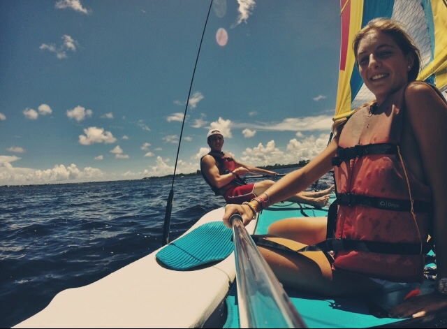 Junior Olivia Garnica and Gables alumnus Jacob Slosbergas enjoy their date by sailing.