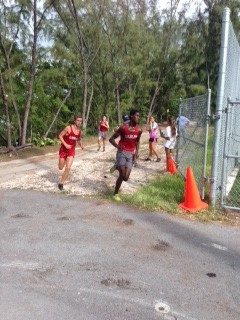 Deshay Fernandes finishing first at a cross country meet in MAST Academy.