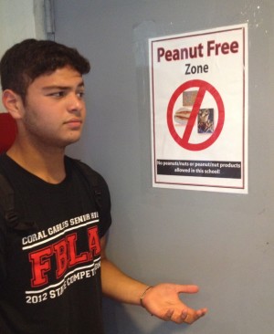 Students like freshman Christian Balsera may wonder why some students and teachers are not following the peanut policy at Gables. 