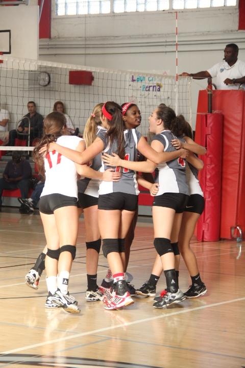 The girls huddle as a team.