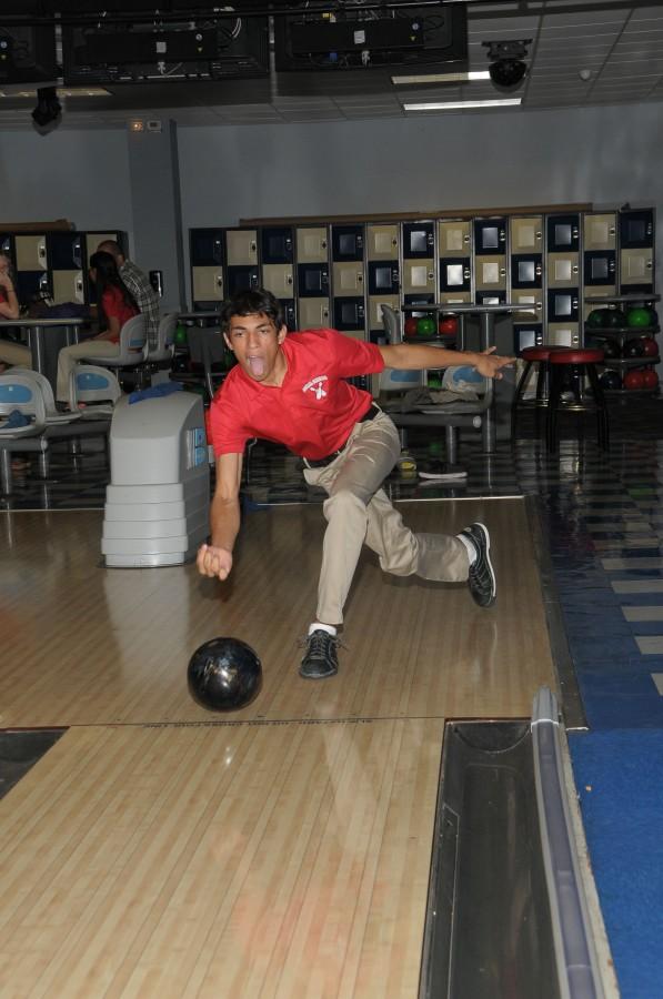 Junior Matthew Monjarrez strikes up a great score for the Gables Bowling team.