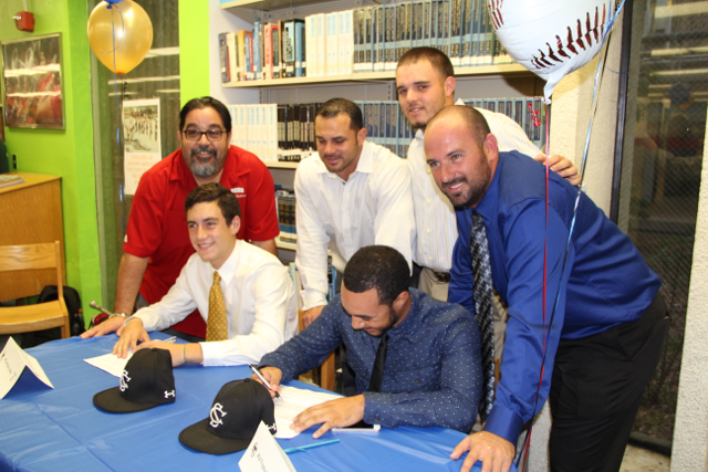 Senior Baseball Players Sign with Colleges