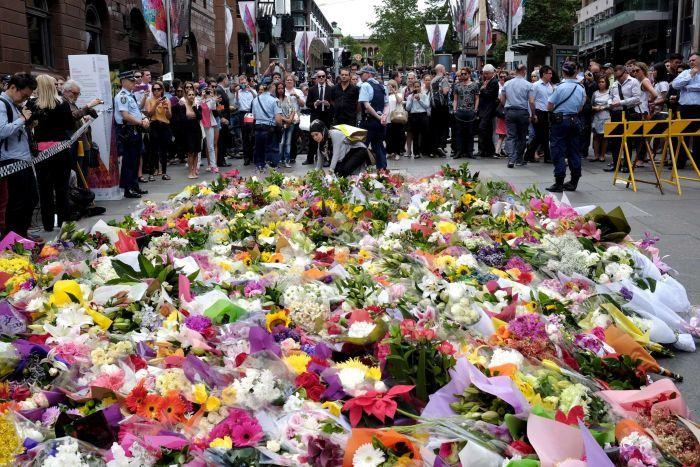 Tribute to the victims killed in Martin Place Lindt cafe shootout.