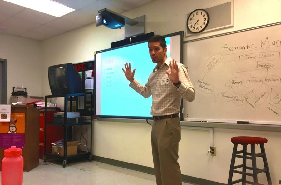 Edward Duran lectures Nelson's IB junior psychology class.