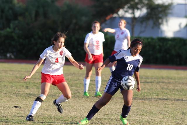 Sophmore Amy Ransom going against one of the Coral Park players.