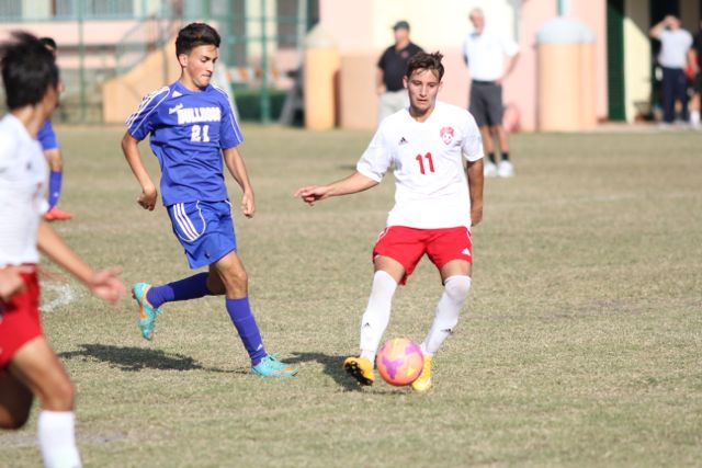 The Cavaliers playing hard against the Braddock Bulldogs.