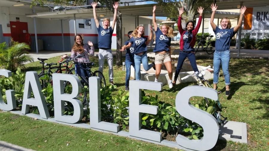 The Gables Earth board jumps with joy behind the newly installed bike rack.