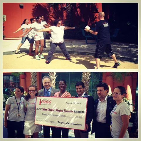 Jennifer Caceres (bottom, second to left) and Healthy Chicas, a weight management program she volunteers her time to, receive a grant for their program.