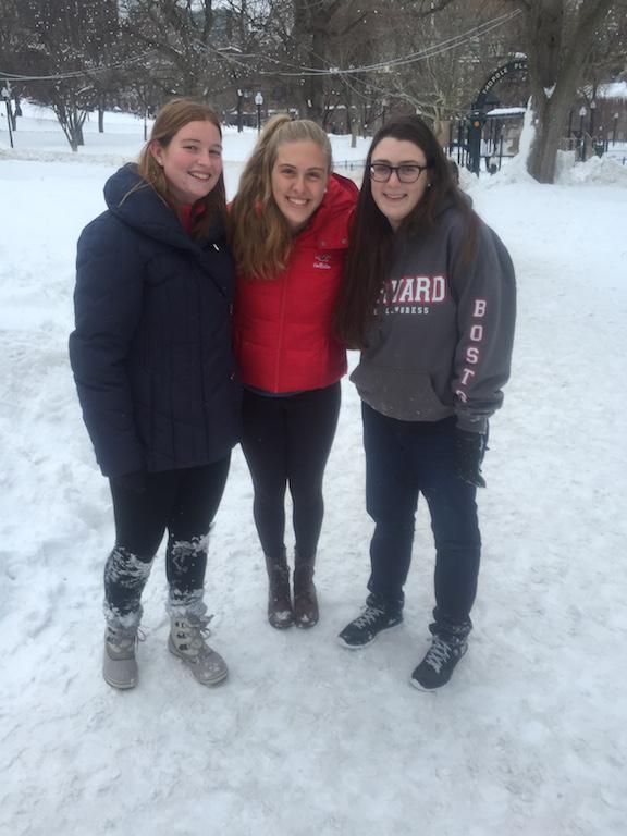 Seniors Claire Shillington and Camila Lupi smile with junior Sophie Feinberg before enjoying the snow.