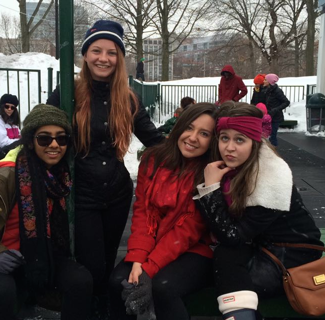 Sophomore Cavaliers pose for a quick photo before ice skating.