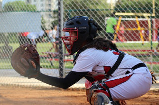This softball player got her catcher's mitt ready.