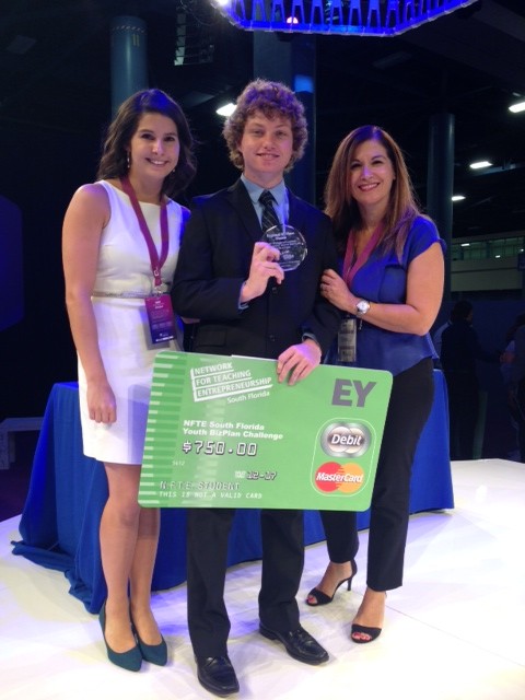 Walsh poses after he won third place in the eMerge Americas Competition.