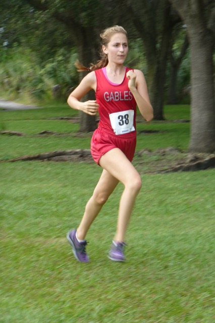 Bauwens sprints as fast as she can to the finish line to improve her personal record. 