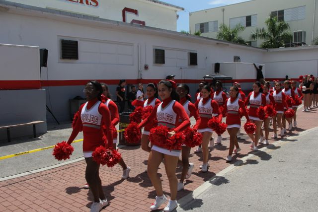 The cheerleaders prepare to perform.