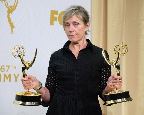 Frances McDormand of Olive Kitteridge after the Emmys holding her two awards.