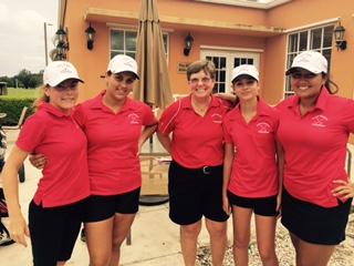 The girls golf team poses after a great round.