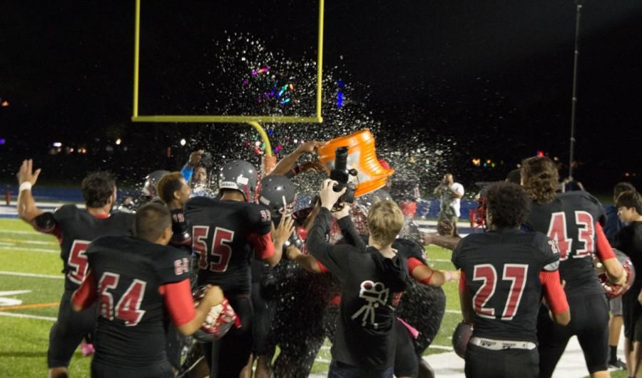 The Cavaliers celebrate after a tough victory against the Columbus Explorers.