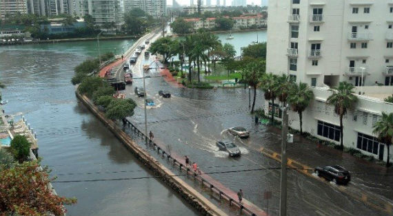 Flooding throughout Miami Beach makes driving difficult.