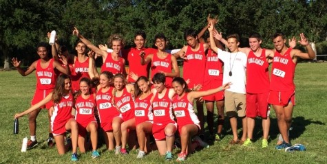 The cross country teams celebrate after both teams got runner-up at Districts.