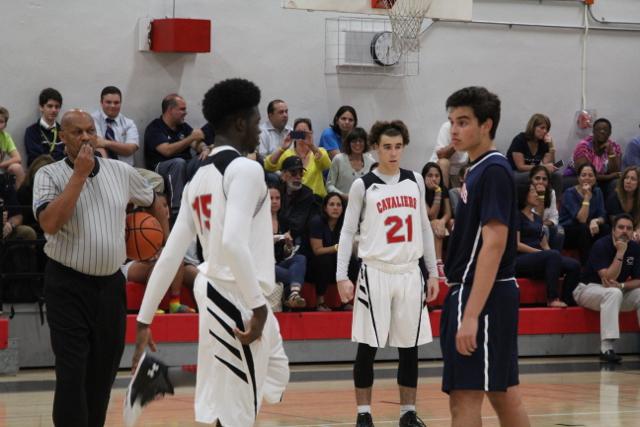 Cavs Beat Out Explorers in Varsity Basketball