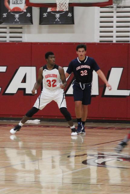 Cavs Beat Out Explorers in Varsity Basketball