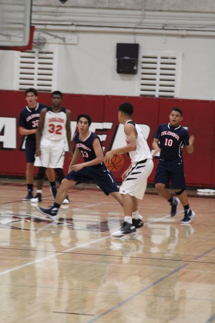 Cavs Beat Out Explorers in Varsity Basketball