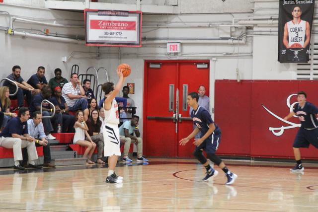 Cavs Beat Out Explorers in Varsity Basketball