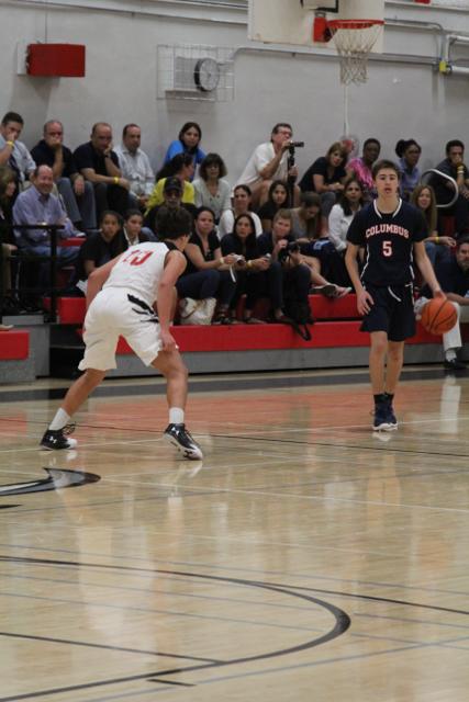 Cavs Beat Out Explorers in Varsity Basketball