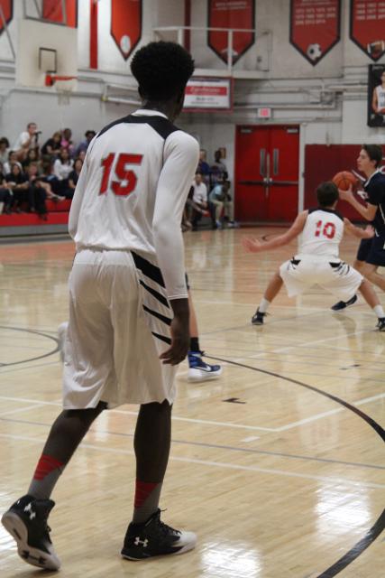 Cavs Beat Out Explorers in Varsity Basketball