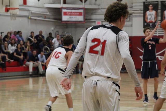 Cavs Beat Out Explorers in Varsity Basketball