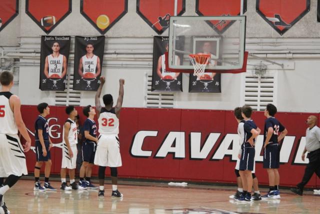 Cavs Beat Out Explorers in Varsity Basketball