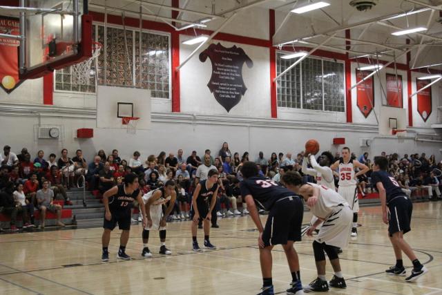 Cavs Beat Out Explorers in Varsity Basketball