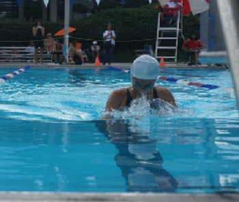 Senior Maya Iskandarani competes in the 100 yard breaststroke.