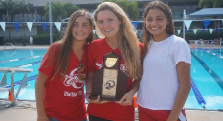 The girls pose with their third District trophy.