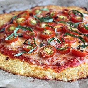 Cauliflower dough is an amazing way of satisfying pizza cravings in a way that is still healthy