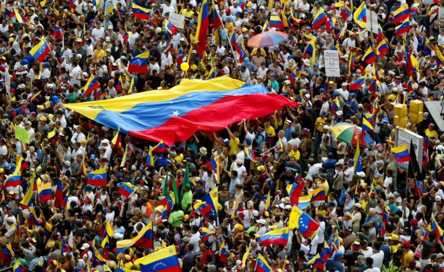 The people of Venezuela cheering after the opposition party won the elections.